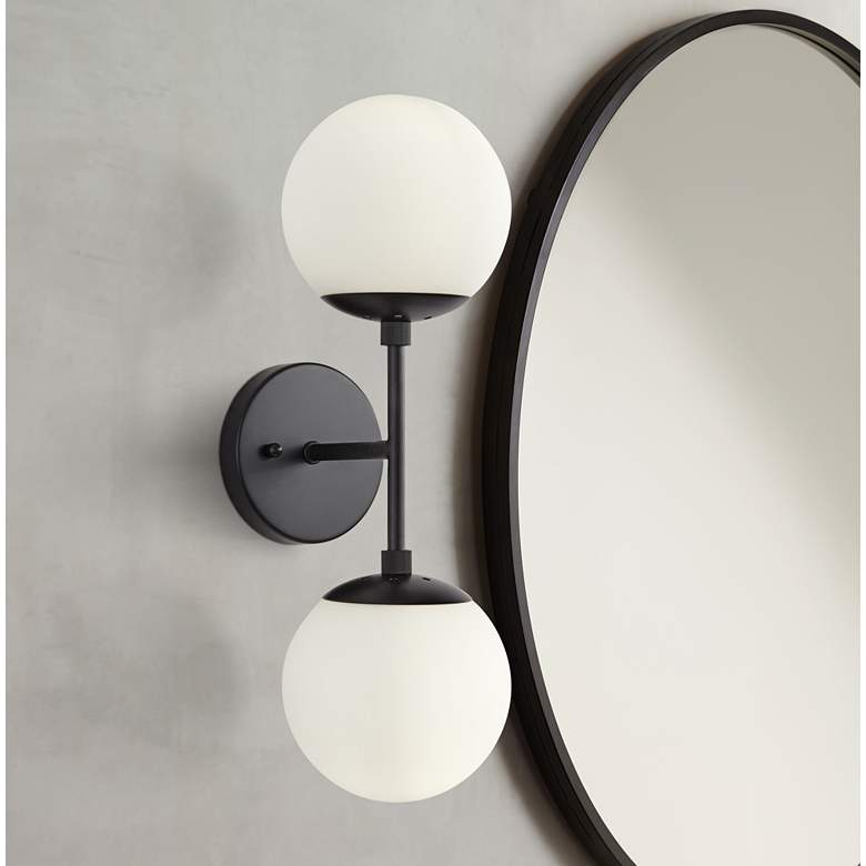 20 3/4" high x 5" wide. Extends 7" from the wall.