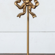 Gold Wreath Stand with Bow